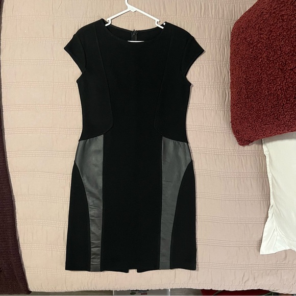 St. John Dresses & Skirts - St. John Black Mini Dress with Leather Accents